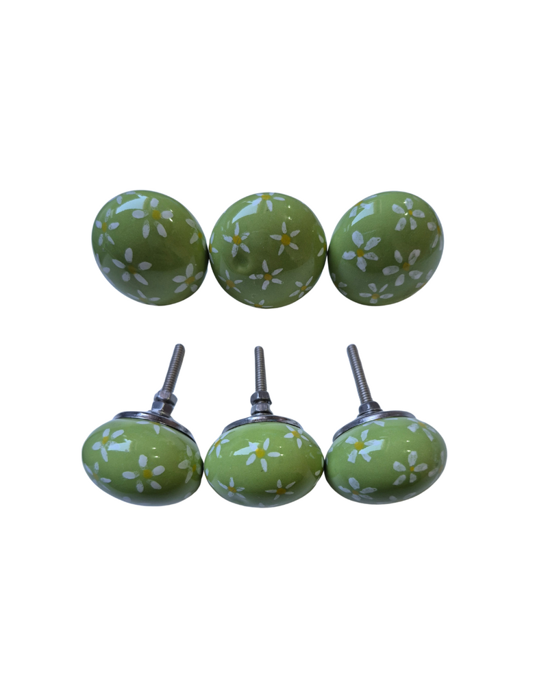 GREEN DAISY
Set of 3
Drawer knob

Each Knob is ~4.5cm wide and 3cm deep.

Screw thread length 3cm

Add a touch of charm to your furniture with this set of 3 Lime Green Drawer Knobs, each adorned with a delicate daisy design. These playful knobs bring a vibrant pop of color and a hint of whimsy to any room. Perfect for refreshing drawers, cabinets, or dressers, their cheerful aesthetic pairs beautifully with a variety of styles, adding a fresh, floral accent wherever they’re used.