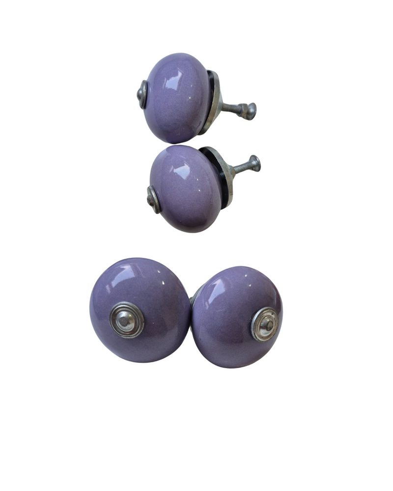 LILAC
Set of 2
Drawer knob

Each Knob is ~4cm wide 3cm deep.

Screw thread length 2.5cm

Add a subtle touch of elegance to your furniture with this set of 2 Lilac Ceramic Drawer Knobs. The soft lilac hue offers a calming, sophisticated look, perfect for refreshing drawers, cabinets, or dressers. With their smooth ceramic finish, these knobs bring a gentle pop of colour and timeless style to any room, enhancing your space with a delicate and refined accent.