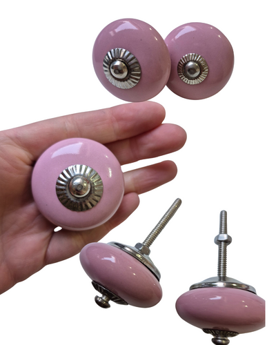 PINK Ceramic
Set of 2
Drawer knob

Each Knob is ~4cm wide 2.5cm deep.

Screw thread length 4cm

Add a touch of bold elegance to your furniture with these Pink Ceramic Drawer Knobs, featuring a dusty pink ceramic knob, complemented by stylish silver hardware.Perfect for updating drawers, cabinets, or dressers, these knobs effortlessly combine modern flair with classic charm.