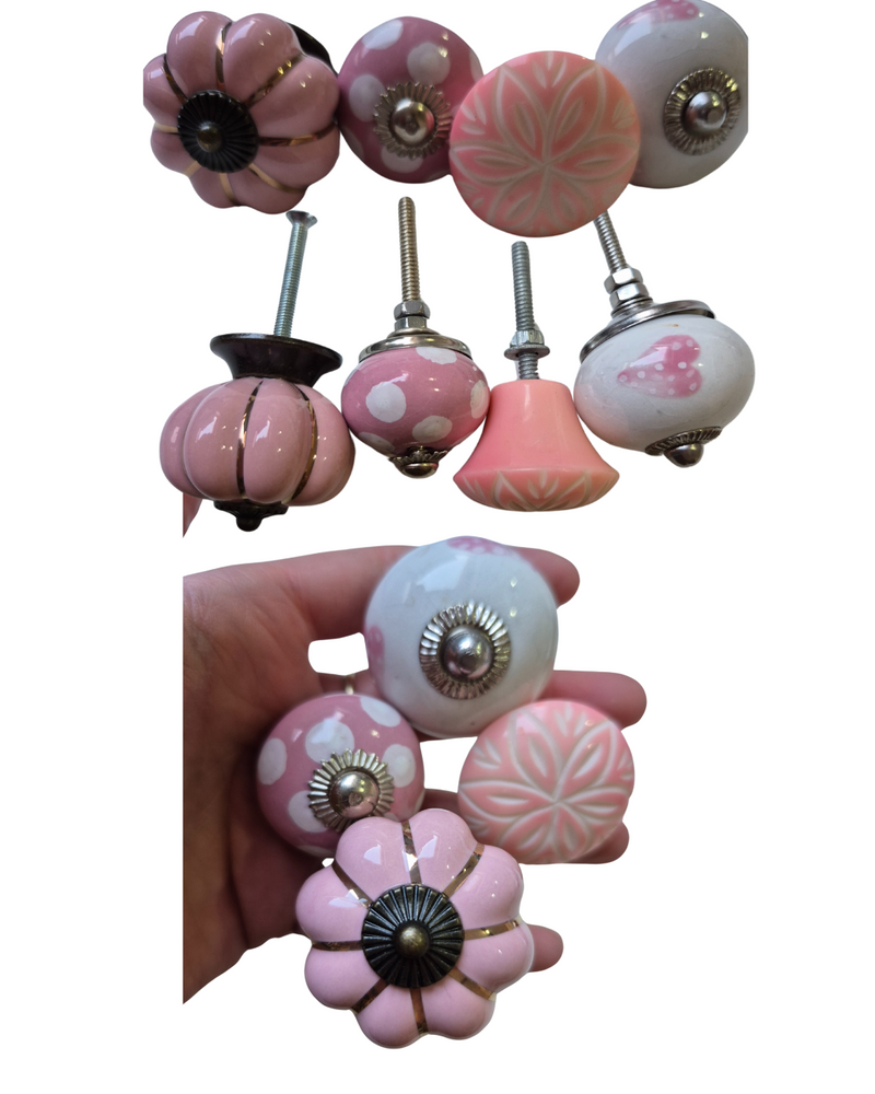 PINK Mix Ceramic
Set of 4
Drawer knob

Each Knob is ~3.5-4cm wide 2.5-3.5cm deep.

Screw thread length 4cm

Brighten up your furniture with this set of 4 Pink Ceramic Drawer Knobs, each featuring a unique design – hearts, spots, and floral patterns. The soft pink hue adds a warm, inviting touch, while the playful designs bring personality and charm to any room. Perfect for updating drawers, cabinets, or dressers, these knobs offer a fun and stylish way to refresh your space with a sweet and whimsical flair.