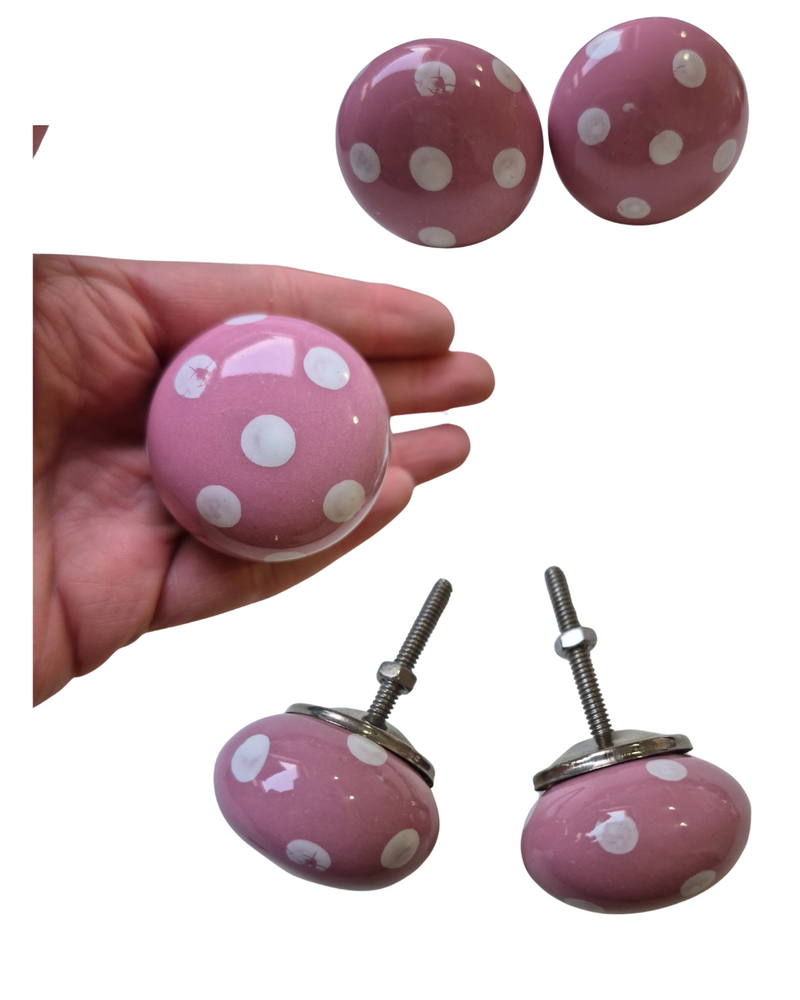 PINK SPOTTY
Set of 2
Drawer knob

Each Knob is ~4cm wide 3cm deep.

Screw thread length 4cm

Add a soft, charming touch to your furniture with this set of 2 Dusty Pink Ceramic Drawer Knobs, each featuring white spots for a playful yet elegant look. The gentle dusty pink tone combined with the contrasting white spots creates a stylish, vintage-inspired aesthetic. Perfect for refreshing drawers, cabinets, or dressers, these knobs bring a subtle pop of colour and a sweet, inviting feel to any room.