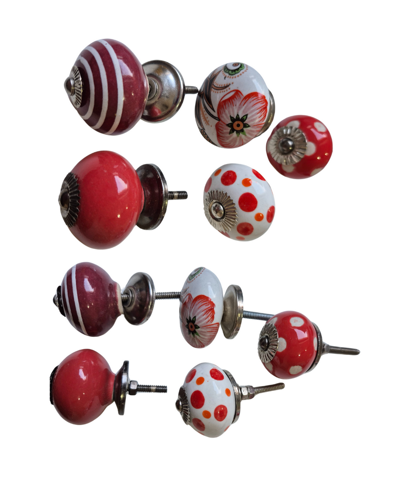 RED MIX
Set of 5
Drawer knob

Each Knob is ~3.5-4.5cm wide 3cm deep.

Screw thread length 3cm

Add a bold pop of colour to your furniture with this set of 5 Red Drawer Knobs, each featuring a different pattern, including stripes, spots, and floral designs. The vibrant red hue combined with the diverse patterns creates a playful yet stylish look, perfect for updating drawers, cabinets, or dressers. These knobs offer a fun and dynamic way to refresh your space with a touch of personality and charm.